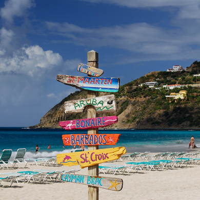 Caribbean beach sign to areas